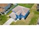 Two-story house with a large yard and two-car garage at 1233 Nelson Park Court, Poinciana, FL 34759