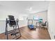 Versatile bonus room with home gym and workspace at 1233 Nelson Park Court, Poinciana, FL 34759