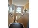 Dark wood staircase leading to the upper level of the home at 306 Athabasca Pl, Kissimmee, FL 34759