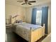 Bedroom with a light-colored bed and window at 306 Athabasca Pl, Kissimmee, FL 34759