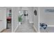 Bright hallway with tile floors, leading to living room at 688 Stone Oak Dr, Sanford, FL 32771