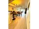 Bright dining room with hardwood floors and chandelier at 7652 Whisper Way # 302, Reunion, FL 34747