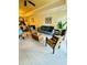 Living room with light flooring and comfy seating at 7652 Whisper Way # 302, Reunion, FL 34747
