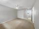 Bright bedroom with carpet flooring and large closet at 360 Golfside Cv # 360, Longwood, FL 32779