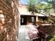 Brick townhome with walkway leading to the entrance at 360 Golfside Cv # 360, Longwood, FL 32779