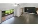 Spacious living room with sliding glass doors leading to patio at 360 Golfside Cv # 360, Longwood, FL 32779