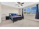 Spacious bedroom with a large bed and ceiling fan at 706 Costa Ln, Debary, FL 32713