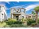 Two-story house with gray siding, shutters, and landscaping at 706 Costa Ln, Debary, FL 32713