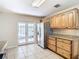 Kitchen with stainless steel appliances and backyard access at 601 Marlin Rd, Winter Springs, FL 32708