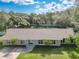 Single story home with a large backyard and driveway at 601 Marlin Rd, Winter Springs, FL 32708