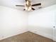 Simple bedroom with ceiling fan and neutral carpeting at 601 Marlin Rd, Winter Springs, FL 32708