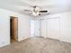 Spacious bedroom with ample closet space and ceiling fan at 601 Marlin Rd, Winter Springs, FL 32708