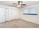 Bright bedroom featuring a large closet and ceiling fan at 601 Marlin Rd, Winter Springs, FL 32708