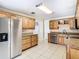 Kitchen with granite counters and stainless steel appliances at 601 Marlin Rd, Winter Springs, FL 32708