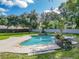 Enjoy the refreshing pool and lush landscape at 601 Marlin Rd, Winter Springs, FL 32708