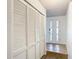 Entryway with white walls, wood-look floors and a white door at 601 Marlin Rd, Winter Springs, FL 32708