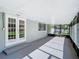 White French doors open to a covered patio at 601 Marlin Rd, Winter Springs, FL 32708