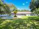 Spacious backyard with pool and screened patio at 601 Marlin Rd, Winter Springs, FL 32708