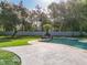 Inviting kidney-shaped pool with flagstone at 601 Marlin Rd, Winter Springs, FL 32708