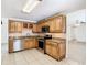 Kitchen with granite countertops and stainless steel appliances at 601 Marlin Rd, Winter Springs, FL 32708