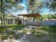 Backyard with pergola and grassy area at 601 Marlin Rd, Winter Springs, FL 32708