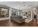 Spacious living room with hardwood floors and large windows at 8300 Ludington Cir, Orlando, FL 32836