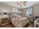 Bright bedroom featuring a comfortable bed and stylish nightstands at 8300 Ludington Cir, Orlando, FL 32836