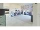 Home office with a floral wall mural, desk, and vanity at 181 Silver Maple Bnd, Davenport, FL 33837