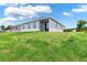 Elevated backyard with grassy area at 506 Ellie Ct, Apopka, FL 32703