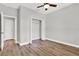 Bedroom with closet and wood-look flooring at 506 Ellie Ct, Apopka, FL 32703