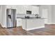 Modern kitchen with stainless steel appliances and granite countertops at 506 Ellie Ct, Apopka, FL 32703