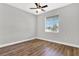 Spacious bedroom with ceiling fan and wood-look floors at 506 Ellie Ct, Apopka, FL 32703