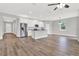 Open kitchen with stainless steel appliances and an island at 506 Ellie Ct, Apopka, FL 32703