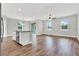 Open concept kitchen with island and stainless steel appliances at 506 Ellie Ct, Apopka, FL 32703