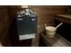 Relaxing sauna with wooden interior and traditional bucket at 435 Caribbean Dr, Davenport, FL 33897