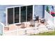 Private patio with brick pavers and a white picket fence at 435 Caribbean Dr, Davenport, FL 33897