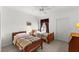 Twin bedroom with two beds and ceiling fan at 8810 Dunes Ct # 203, Kissimmee, FL 34747
