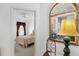 Cozy bedroom with a comfortable bed, window coverings, and ample natural light at 8810 Dunes Ct # 203, Kissimmee, FL 34747