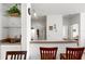 Kitchen with a breakfast bar and yellow cabinets at 8810 Dunes Ct # 203, Kissimmee, FL 34747