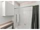Neat bathroom with shower/tub combo and linen closet at 8810 Dunes Ct # 203, Kissimmee, FL 34747