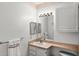 Well-lit bathroom with vanity and toilet at 8810 Dunes Ct # 203, Kissimmee, FL 34747