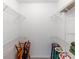 Large walk-in closet with wire shelving for storage at 8810 Dunes Ct # 203, Kissimmee, FL 34747