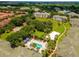 Expansive community with resort-style pool and lush landscaping at 8810 Dunes Ct # 203, Kissimmee, FL 34747