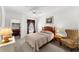 Cozy bedroom with double bed, and window at 8810 Dunes Ct # 203, Kissimmee, FL 34747