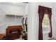 Walk-in closet with shelving and hanging space at 8810 Dunes Ct # 203, Kissimmee, FL 34747