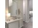 Bright entryway with mirror and contemporary console table at 1505 Carey Palm Cir, Kissimmee, FL 34747