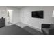 Bright bedroom with large TV and plenty of closet space at 1505 Carey Palm Cir, Kissimmee, FL 34747
