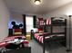 Mickey Mouse themed bedroom with twin and bunk beds at 1505 Carey Palm Cir, Kissimmee, FL 34747