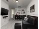 Home theater room with large TV and comfortable seating at 1505 Carey Palm Cir, Kissimmee, FL 34747