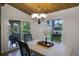 Dining room with table and chairs, offering a view of the outdoors at 200 Maitland Ave # 2, Altamonte Springs, FL 32701